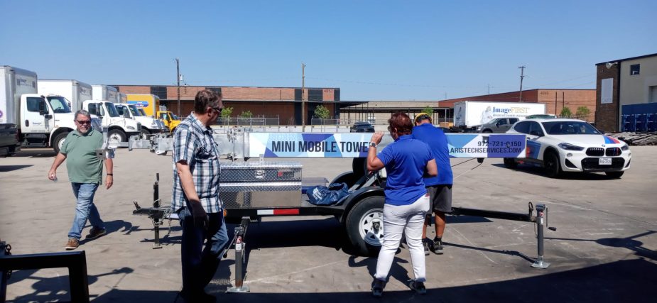 image0 (1) Solaris Technologies Services tellling a customer about portable cell tower benefits.