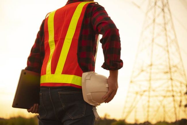 Engineers wear high telecommunication monitoring safety devices to maintain 5G networks, working with risky work. The Importance of Annual Maintenance for Mobile Cell Towers