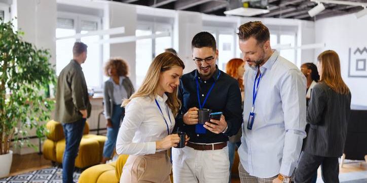 Colleagues talking about business Maximizing Event Connectivity With Advanced WiFi Towers Solutions by Solaris Technologies Services