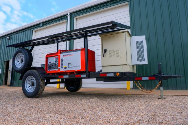 Solaris Mobile Power Station connected to a Cell-on-Wheels tower at a remote construction site during deployment.