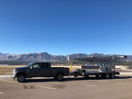 Mobile coverage expansion in a rural area with a cell-on-wheels from Solaris Technologies Services.